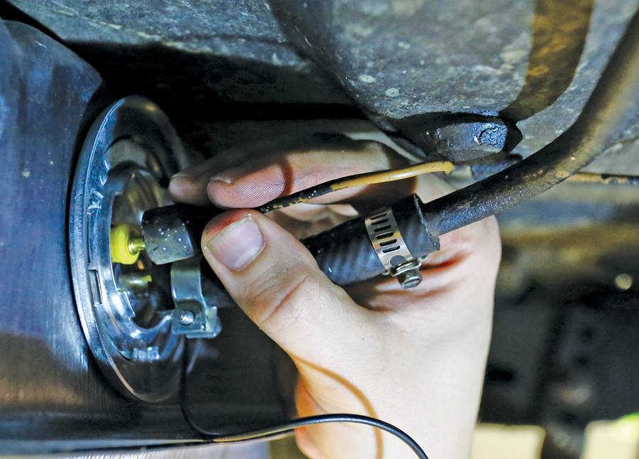 Hook up the fuel line, vent line, sending-unit signal wire and ground. Make certain that all connections are tight, and be sure to replace any hoses that appear worn.