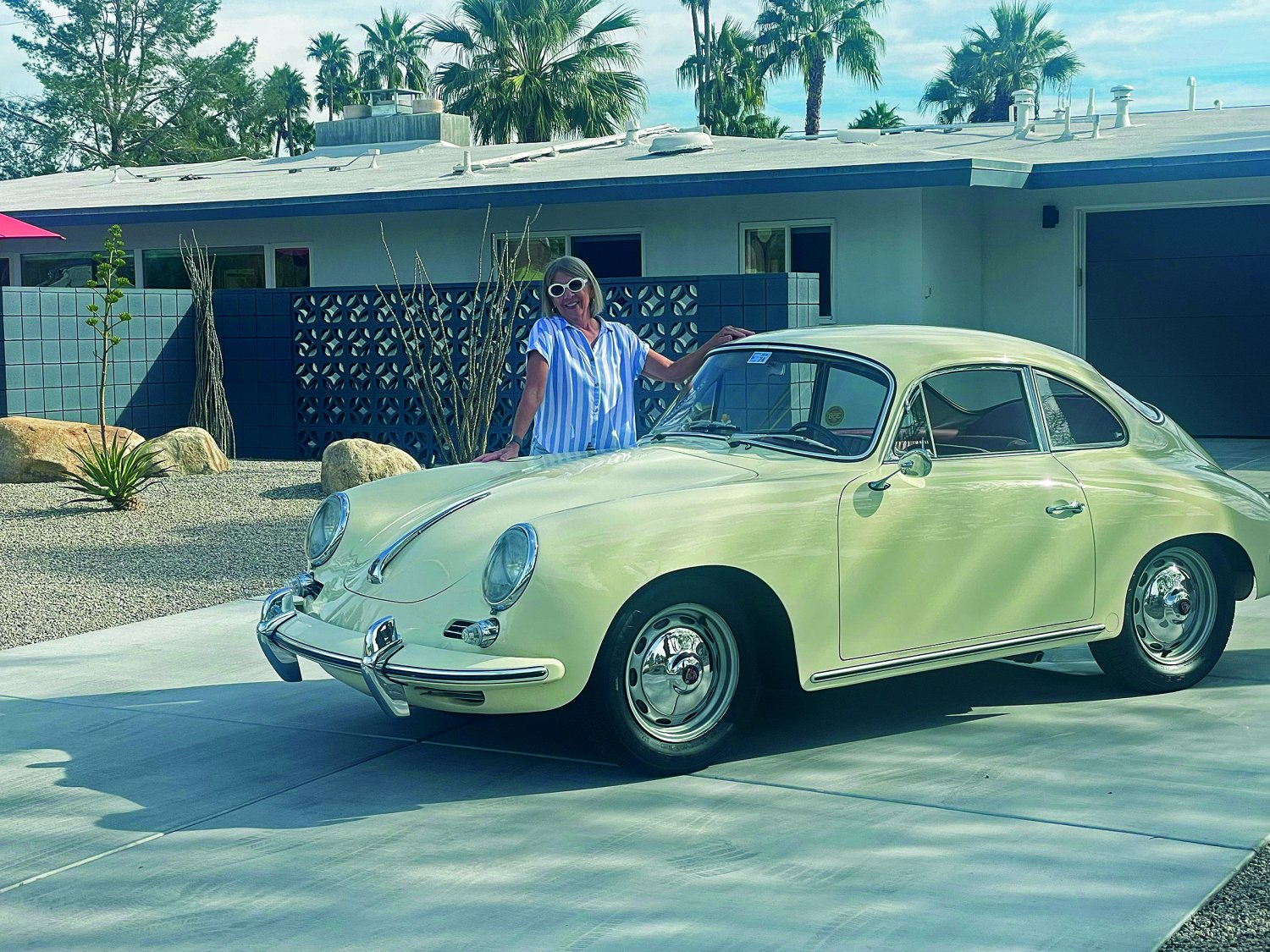 Dolly with photographic evidence that her beloved 1963 Porsche 356B actually exists
