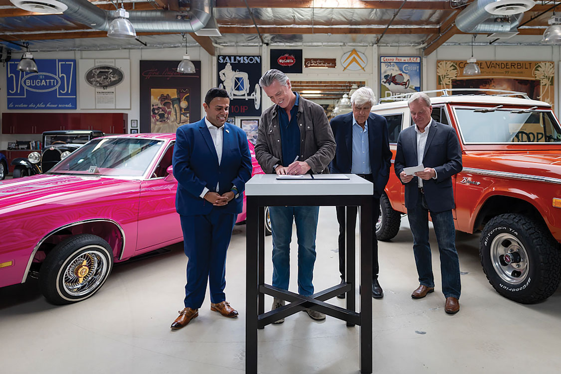 California Governor Gavin Newsom signs Leno’s Law at Jay Leno’s garage in Burbank